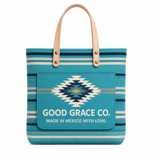 Fernando Tote in turquoise with Aztec-inspired woven detail on natural canvas, made in Mexico — front view